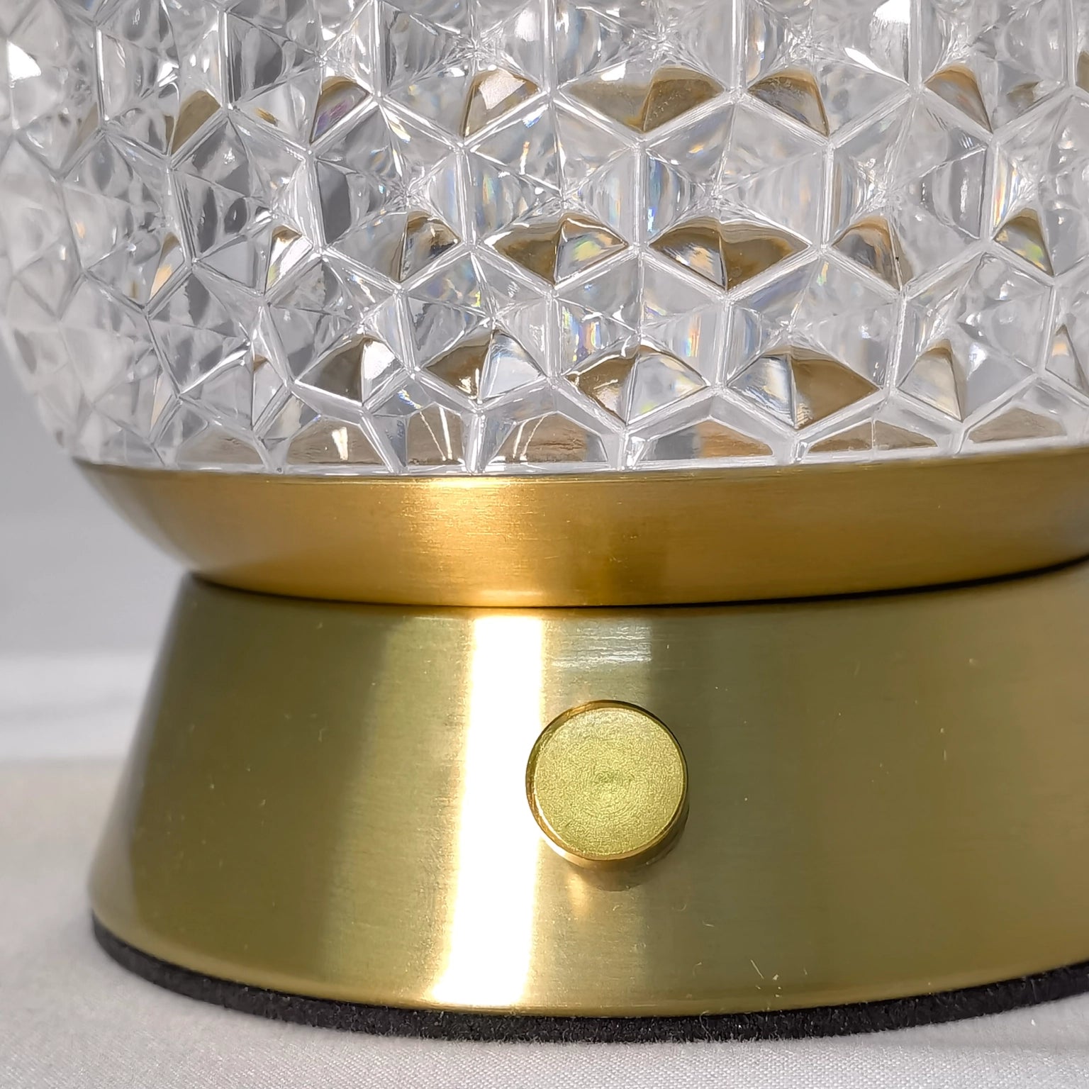 Modern design cordless rechargeable table lamp LED dimmable light, featuring a sleek silver metal base and a glass cover, giving a helmet-like appearance.