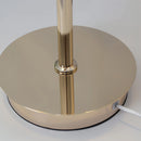 An adjustable Nordic style wall lamp with a rotatable design made of wood and aluminium.