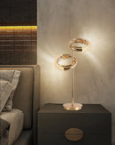 Adjustable Nordic style wall lamp with rotatable design on wooden wall, showcasing interior design elements with a rectangle lampshade emitting warm lighting, creating a cozy and comfortable ambiance.