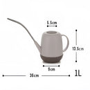 Modern and functional April Showers garden watering can, designed for efficient watering, showcased in a home setting.