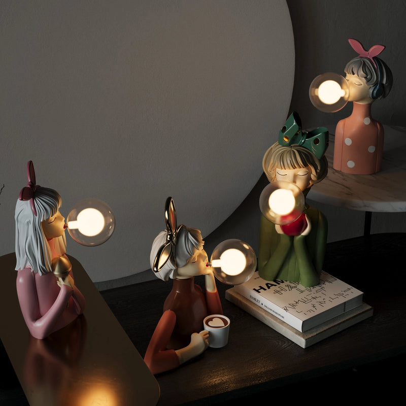 Handcrafted wooden table lamp by Artisan Sisters, featuring an artistic design with a light fixture and lighting accessories, set in a still life photography setting.