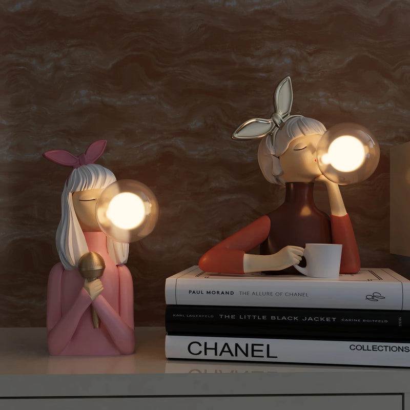 Handcrafted wooden table lamp featuring artistic and fictional character designs, with intricate carvine and illustration details.