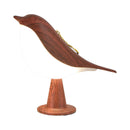 Dimmable LED bird-shaped lamp made of spruce wood with a natural varnish finish, ideal for use as a nightstand light.