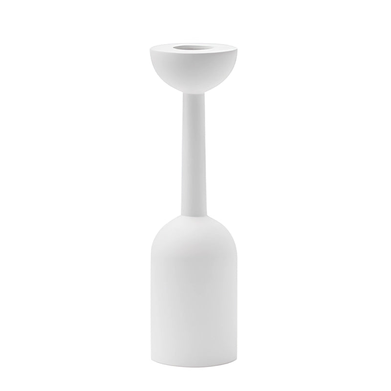 Black wooden candle holder set featuring a white variant, displayed with a magenta background, emphasizing its circular base and wood construction.