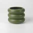 Round ceramic bubble glass planter vase displaying a unique pottery design, placed on a table.