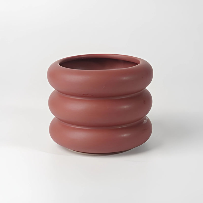Peach-colored ceramic round bubble glass planter vase featuring a pottery design with earthenware and sculptural elements.