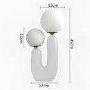 White cactus design table lamp featuring milk glass globes and cold white LED bulbs.