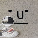 Colorful cartoon design indoor outdoor rug featuring a playful pattern of large, happy eyes on a textured surface.