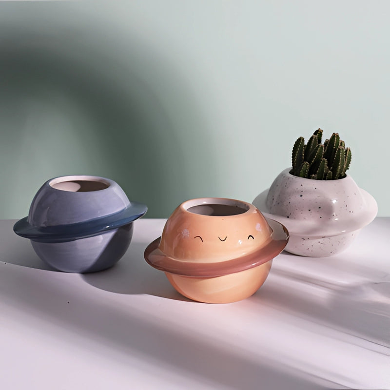 Ceramic plant pot with Astral Galaxy design, featuring a detailed, celestial-themed pattern on high-quality porcelain, ideal for displaying plants.