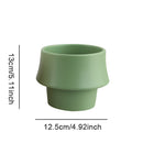 Ceramic planter in Rosa with a glazed finish, styled in a Scandinavian design, inaccurately labeled as drinkware and dishware.