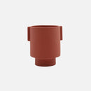 Medium-sized ceramic vase in cinnamon, featuring a Scandinavian design with earthy tones, hand-molded in a blend of shapes, primarily rectangular with circular elements.
