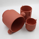 Hand-molded ceramic vase in Scandinavian design featuring earthy tones, displayed on a table setting as a piece of serveware.