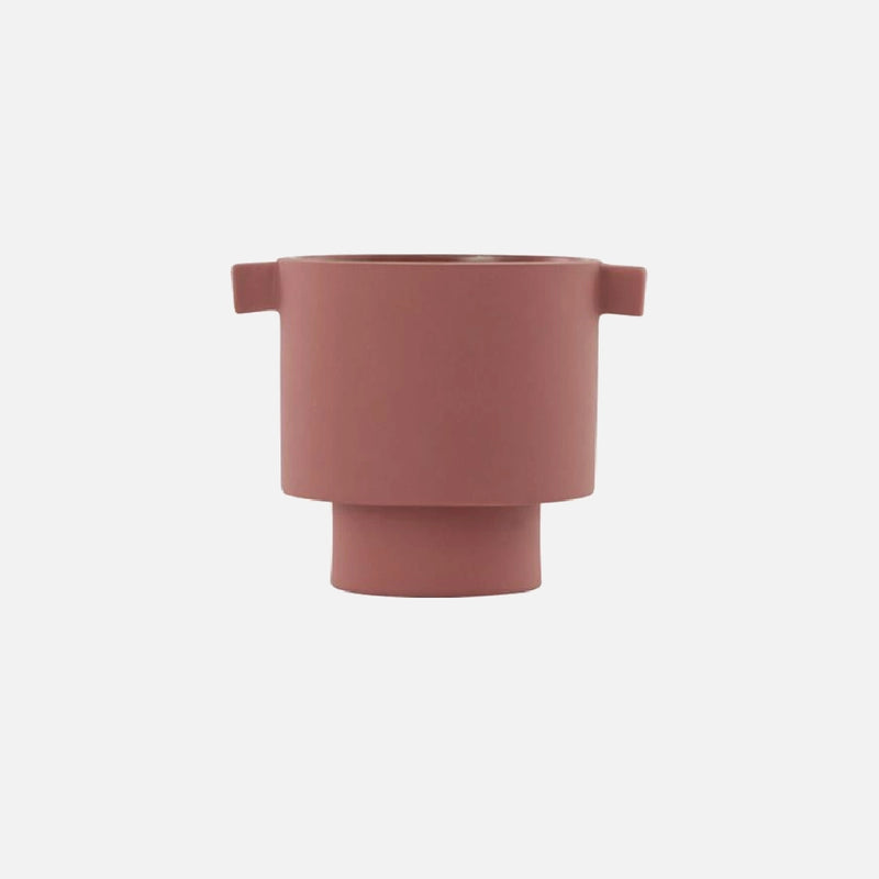 Small cinnamon-colored ceramic vase in a Scandinavian design, featuring earthy tones and hand-molded craftsmanship.