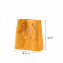 Yellow large ceramic vase designed to resemble a shopping basket.