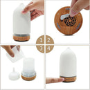 Ceramic aromatherapy diffuser with wood grain design and 7-color night light feature.