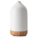 White ceramic wood grain aromatherapy diffuser featuring a 7-color night light, designed in a cylindrical shape with a cone-like top.