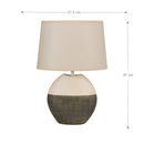 Contemporary beige lampshade table lamp on a wooden rectangular table, ideal for living room and bedroom settings.