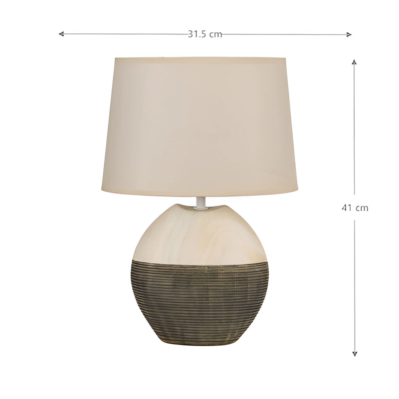 Contemporary beige lampshade table lamp on a wooden rectangular table, ideal for living room and bedroom settings.