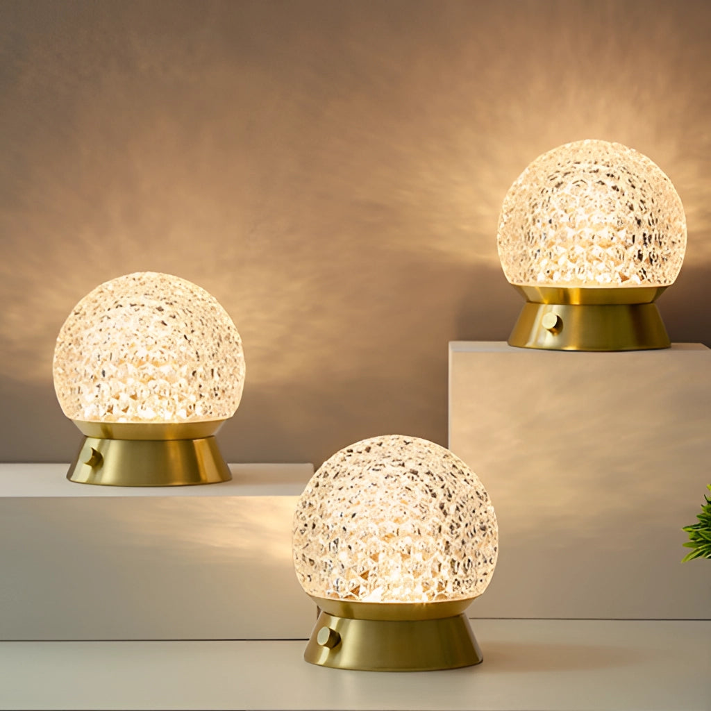 Modern design cordless rechargeable table lamp LED dimmable light in gold, displayed on a table, emphasizing its sleek rectangular shape and suitability for stylish interior settings.