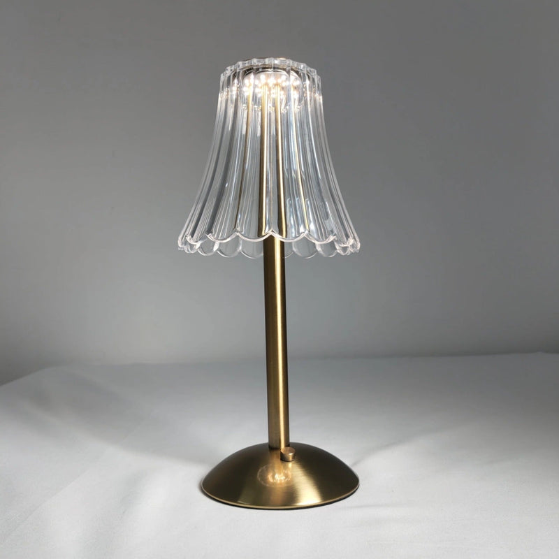 Cordless table lamp featuring a blend of natural wood, glass, and metal materials, emphasizing durability and beautiful design.