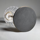 Cordless table lamp designed with a durable and aesthetically pleasing cylinder-shaped body, resembling automotive lighting.