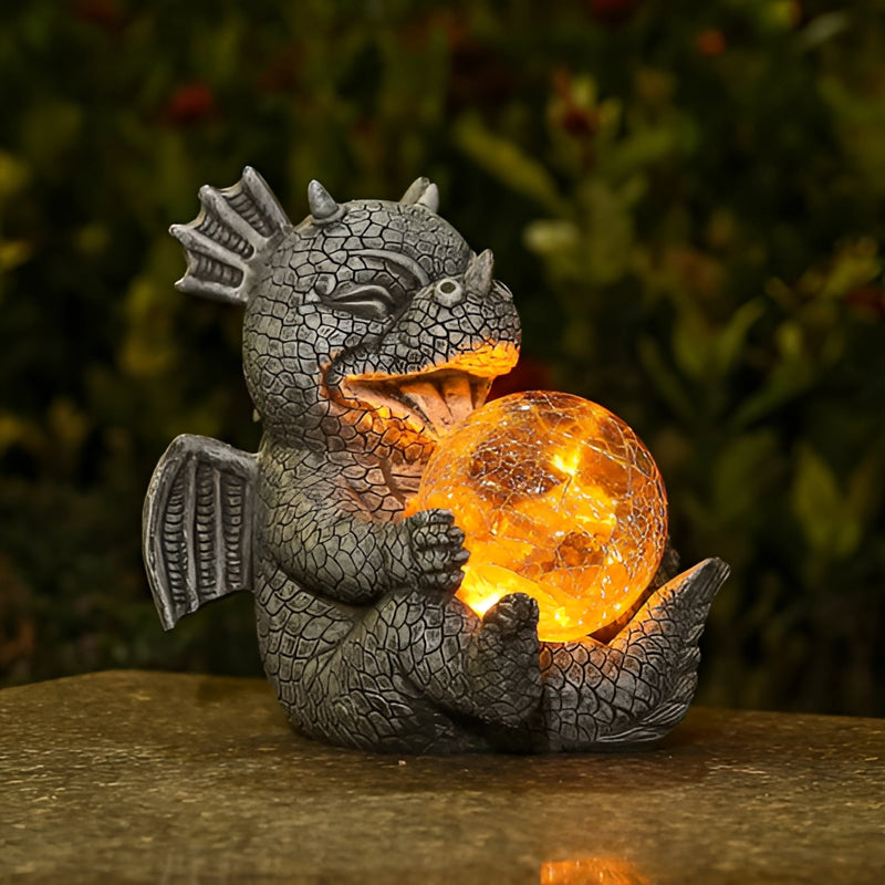 Dragon-shaped LED table lamp resembling a metallic sculpture with intricate carvings, designed to mimic a dragon with a beak-like feature.