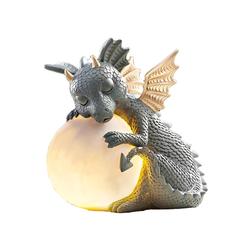 Dragon-shaped LED table lamp designed to resemble a mythical winged creature, crafted from metal and featuring intricate details reminiscent of a fictional character.
