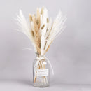 Dried Pampas Grass Flowers Set featuring 30 pieces of natural twigs and flowering plants, ideal for interior decoration, displayed artistically as if at an event.
