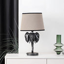 Rechargeable elephant design lamp featuring a metal base and a glass lampshade with artistic tints and shades.