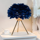 Blue feather LED table lamp with dimmable lighting, featuring artificial blue feather flowers on a table.