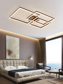 Modern artistic geometric aluminum pendant light featuring LED technology, displayed in a stylish living room with wooden furniture and architectural elements.