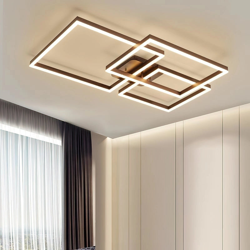 Modern artistic design geometric aluminum pendant light with LED technology, featuring a rectangular metal shade, suspended from a ceiling with a wooden backdrop and contrasting shades.