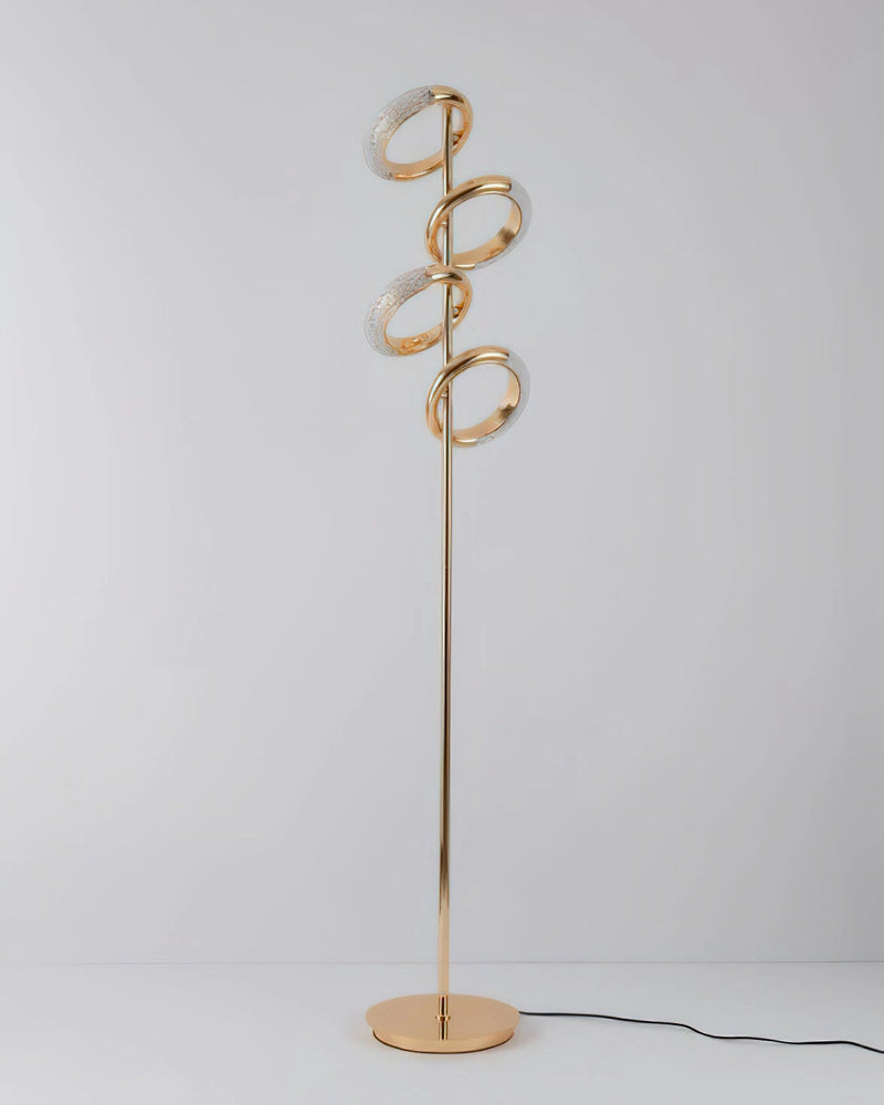 Gold diamond-patterned adjustable angles floor lamp with a metallic finish, featuring intricate twig-like details and a balance of art and fashion elements.