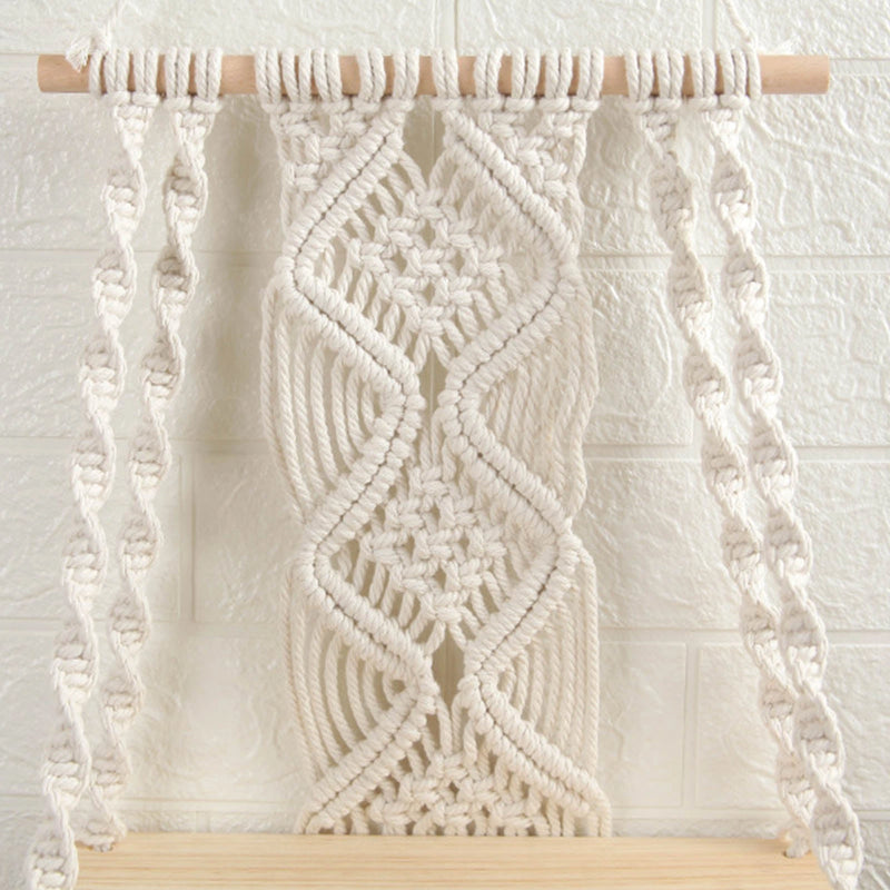 Handwoven macrame boho wall hanging tapestry featuring geometric art decor with beige and brown colors, embellished with doily patterns, displayed on a wooden rectangle.