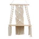 Handwoven Macrame Boho Wall Hanging Tapestry featuring geometric patterns displayed on a wooden backdrop.