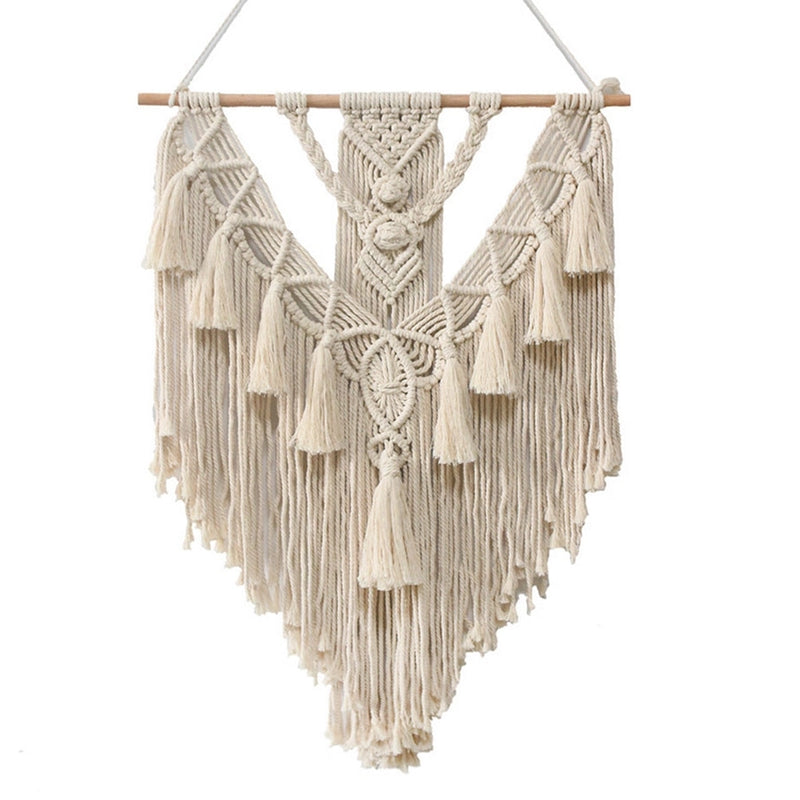 Handwoven macrame boho wall hanging tapestry featuring geometric patterns and symmetrical art design, displayed on a wooden clothes hanger.