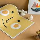 Yellow PVC rug mat with a tropical Aloha pattern featuring circular and rectangular designs, suitable for indoor and outdoor use.