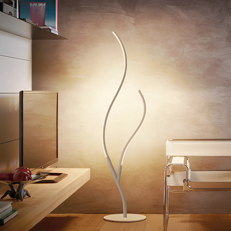 Modern interior lamp with adjustable temperatures, featuring a wooden base and rectangle art design, placed on a table against a wall with wooden flooring.