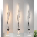 Modern interior lamp featuring adjustable temperatures with a remote control, composed of wood, metal, and glass elements with natural and transparent materials.