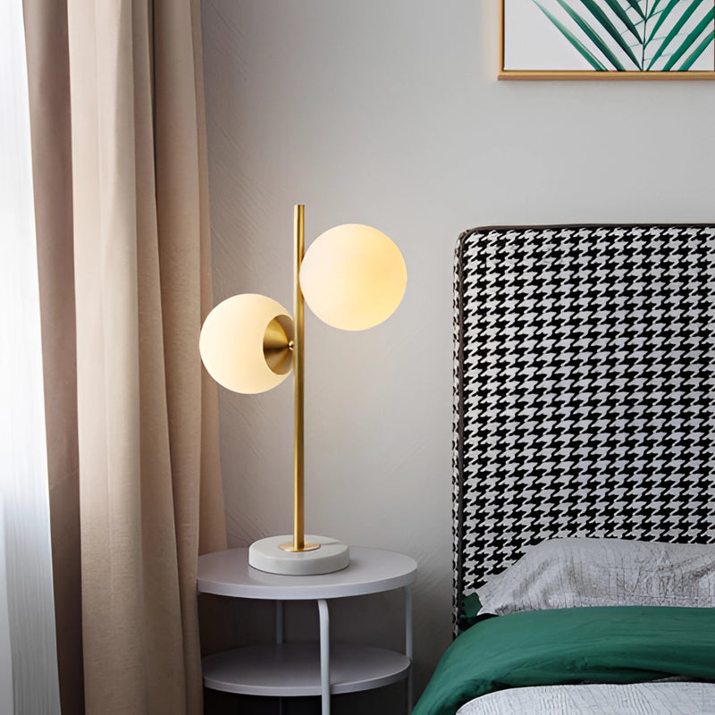 LED desk lamp with smart touch control, featuring energy-saving technology, positioned on a wooden desk with green and yellow accents in a well-lit interior setting.