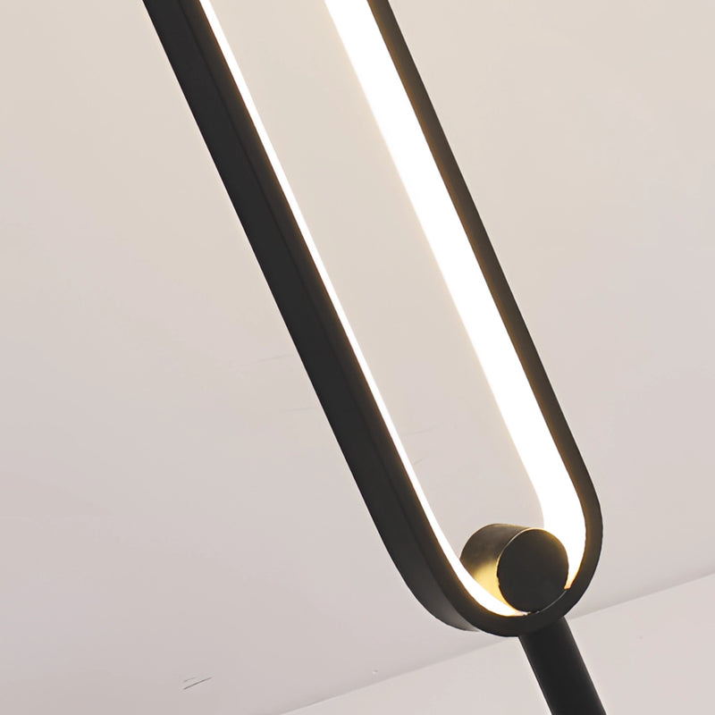 Stylish LED floor lamp with a sleek design, featuring RGB multicolor and warm white lighting options, displayed in a modern interior setting with wooden and metal accents.