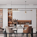 Nordic-inspired sleek LED pendant light hanging over a modern room, featuring furniture like a table, chair, bookcase, and shelving, accented with houseplants in flowerpots.