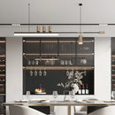 Nordic-inspired sleek LED pendant light hanging over a modern kitchen interior with cabinetry, countertops, and shelving.