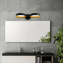 Contemporary iron and acrylic LED wall light sconce featured in a stylishly designed interior with cabinetry, countertop, plant decorations, and shelving.