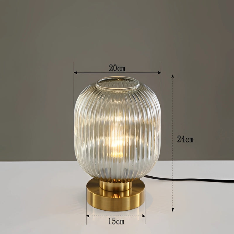 Luminescent crystal table lamp in Bernstein variant, featuring a 20cm tall design with metal elements, artistic jewellery-like embellishments, and a ceiling fixture style top.