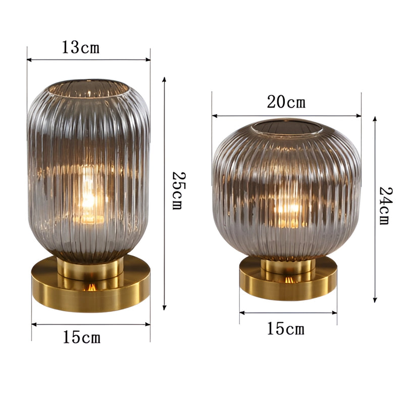 Crystal table lamp with a luminescent glow, featuring metal components and intricate composite materials, designed with circular and rectangular elements.