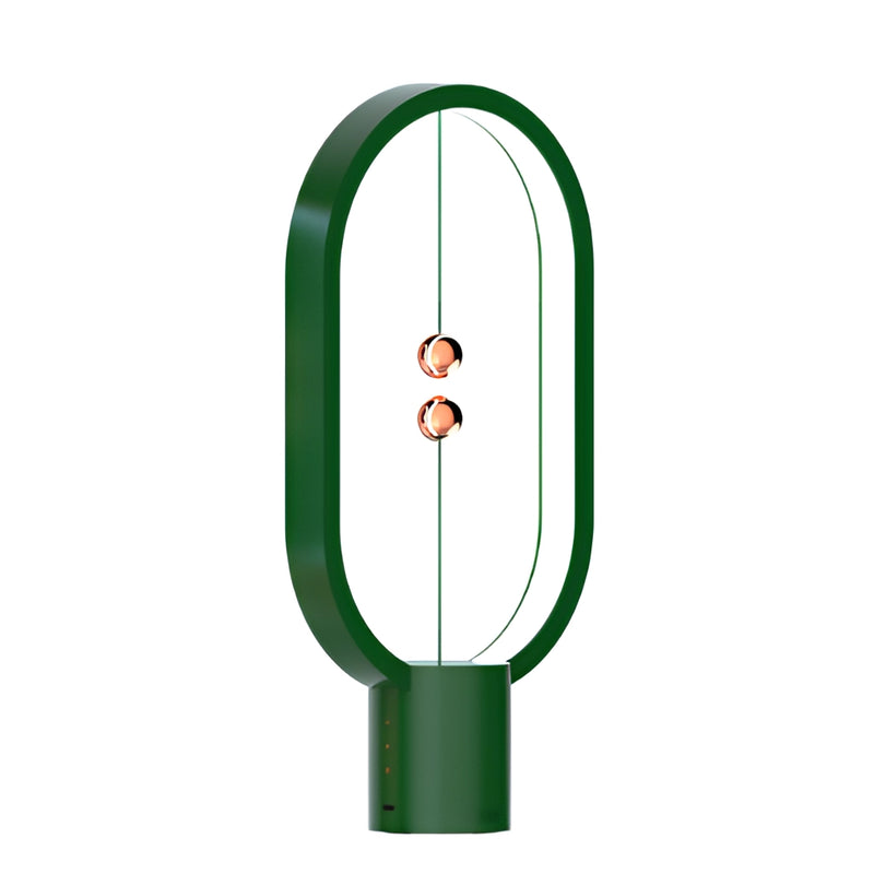 Green Magnetic Balance Table Lamp with LED Lighting featuring a unique circular design and artistic illustration elements.