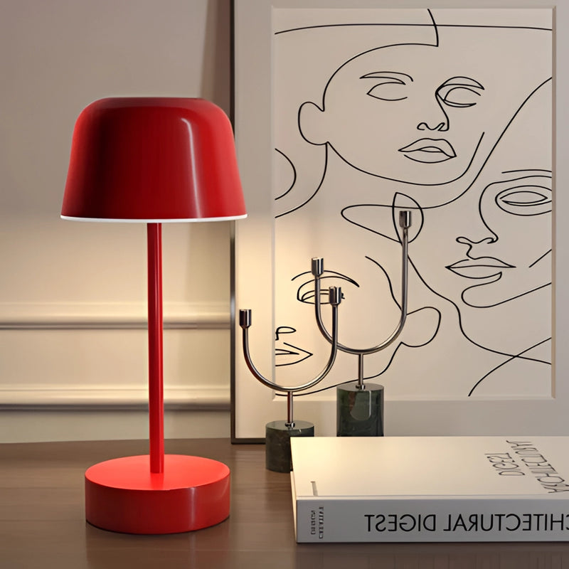 White metal table lamp from the Pulse Flare collection featuring adjustable brightness, showcased in an artistic setting with magenta accents and elegant design elements.