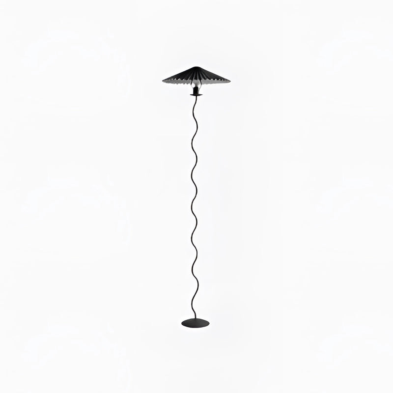 Black metal and textile curved pleated floor lamp with a sleek design and light fixture.