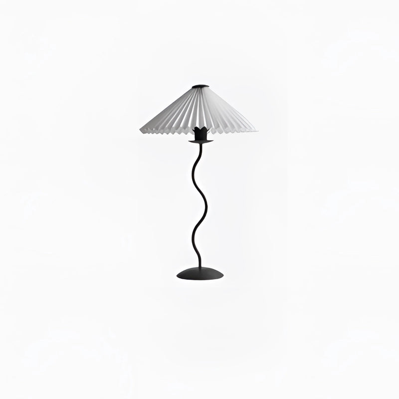 White table lamp with a curved, pleated metal textile lampshade and a sturdy base, designed for indoor use.